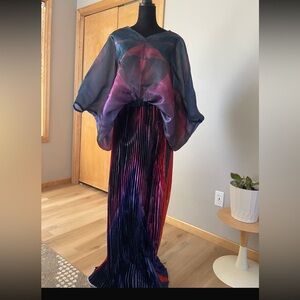 Elegant Multicolor Sheer Blouse and Skirt Set

AC 0226